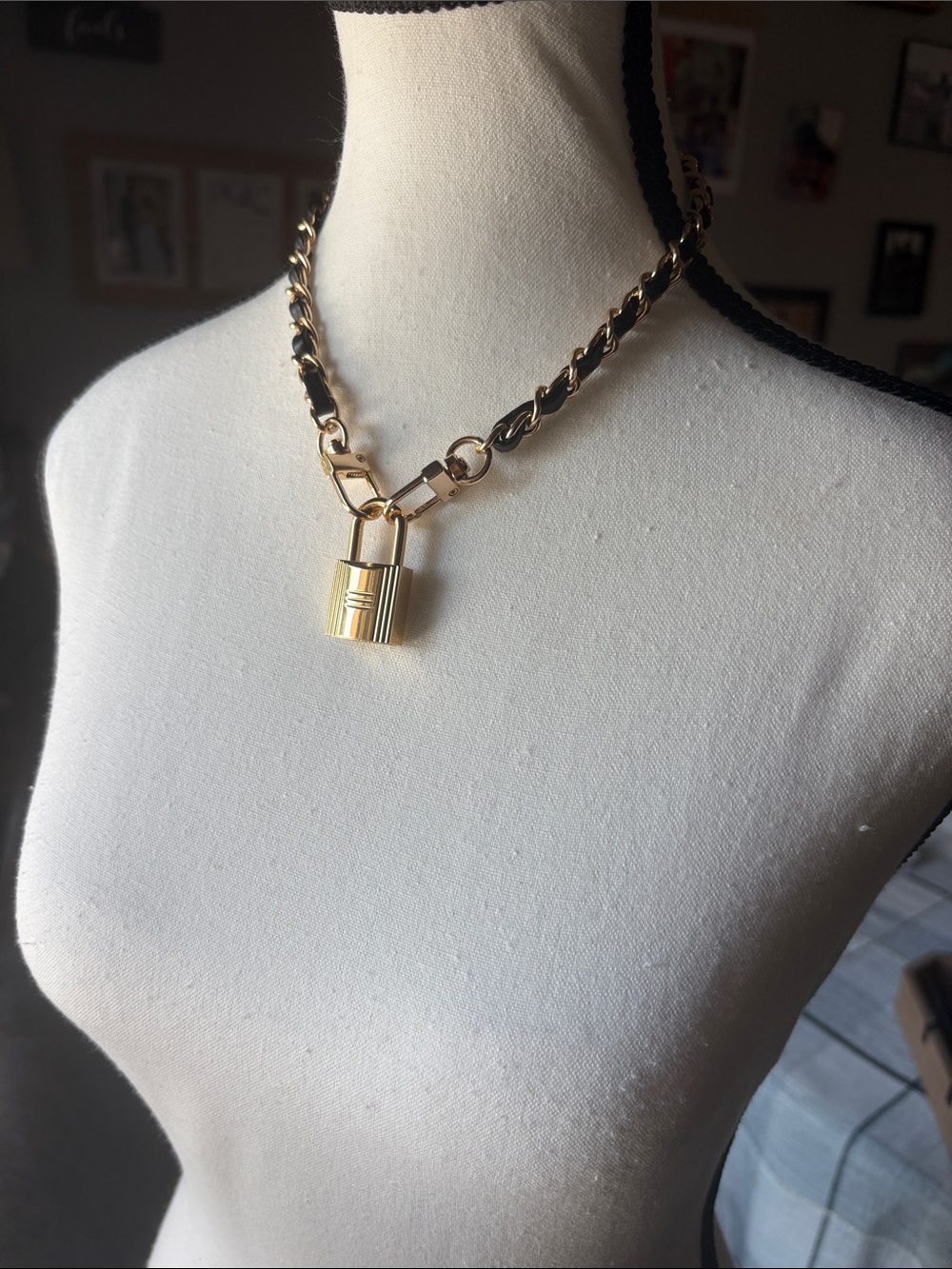Gold tone Padlock Chain Necklace with Black Leather Weave, key included.